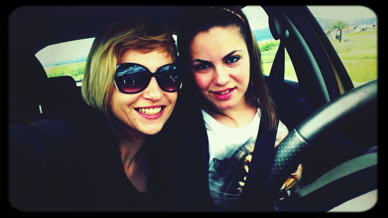 Two women sitting in car