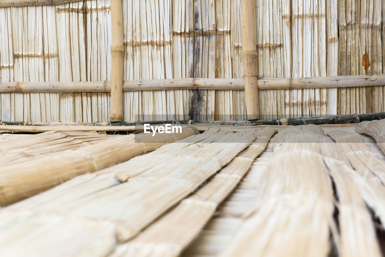 Stack of bamboo on hardwood floor