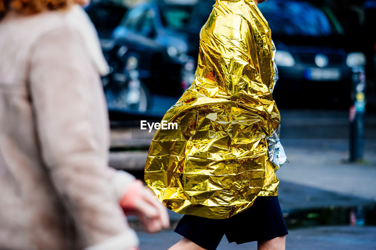 Close-up of person wrapped in blanket