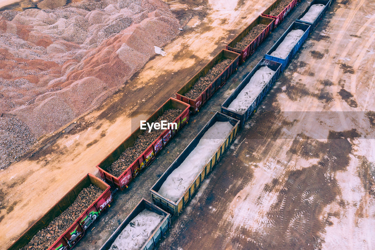 HIGH ANGLE VIEW OF ROAD PASSING THROUGH A LAND