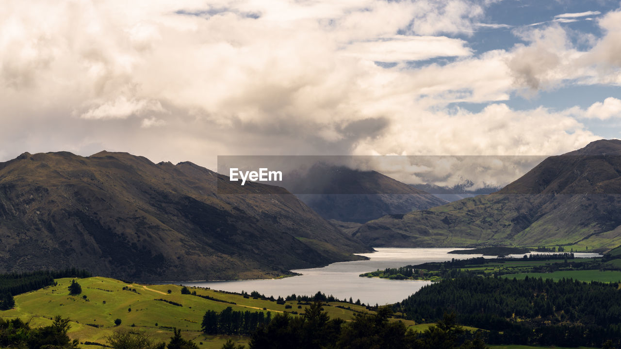 View of landscape against cloudy sky