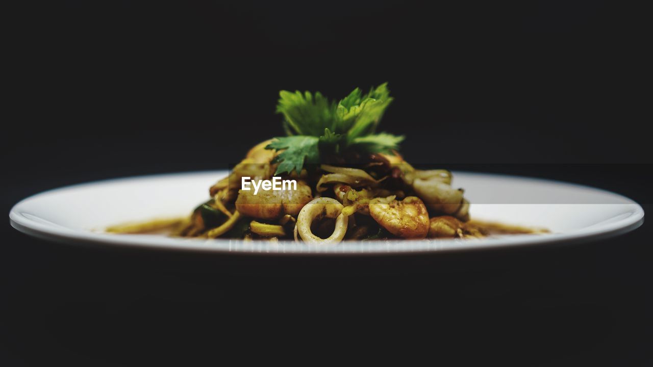 Close-up of noodles in bowl on table