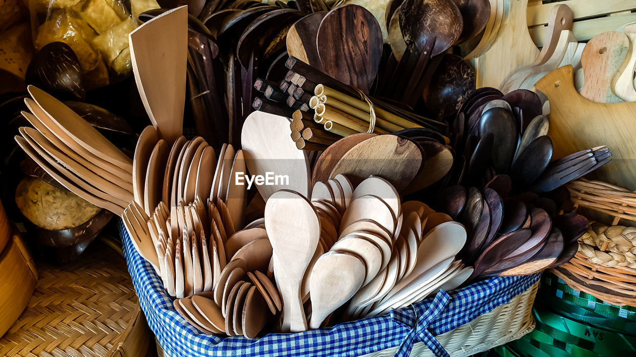 High angle view of wooden kitchen utensils for sale at market