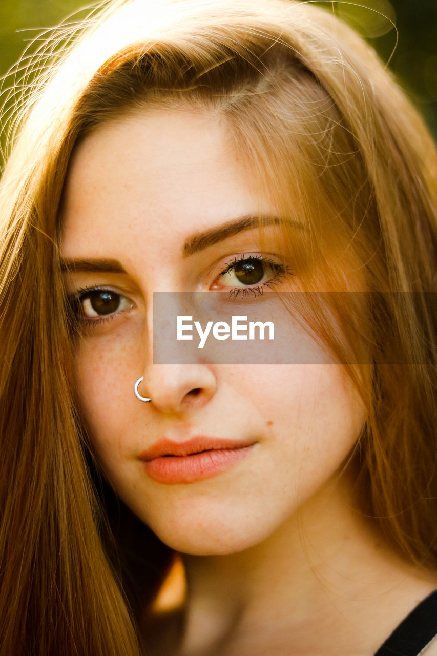 Close-up portrait of young woman