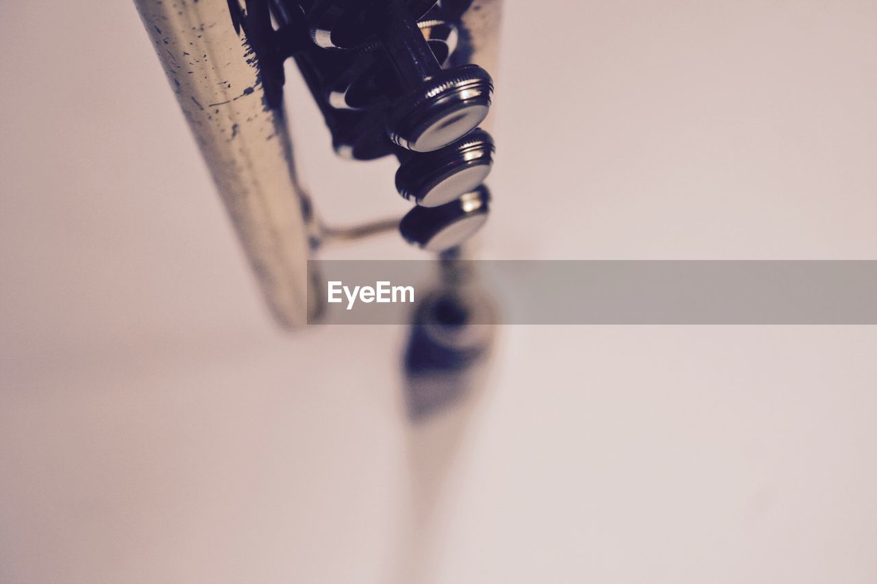 Close-up of musical instrument against white background