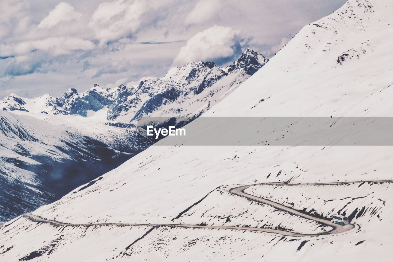 Scenic view of snowcapped mountain against sky