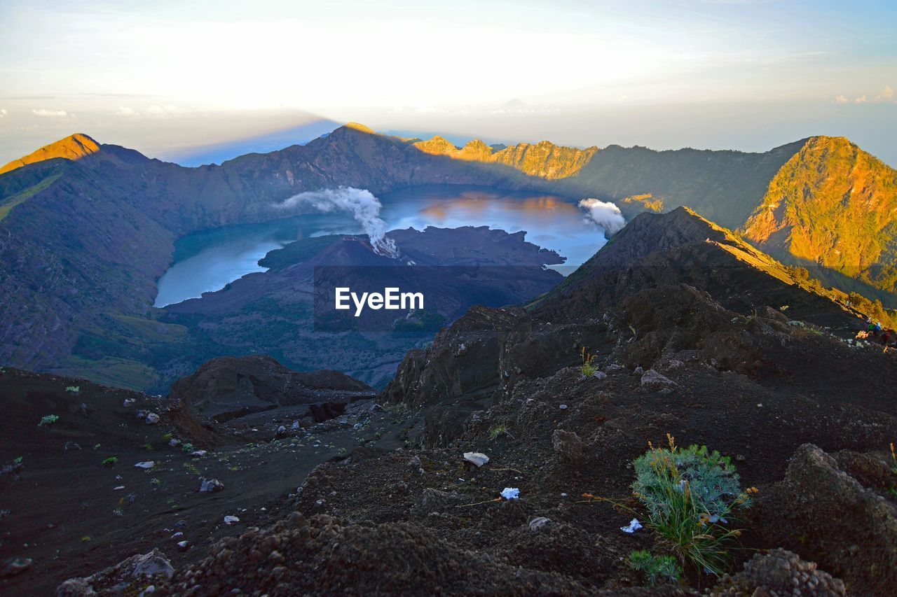 Scenic view of mountains against sky during sunset