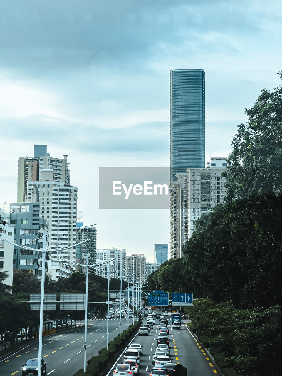 Modern buildings in city against sky