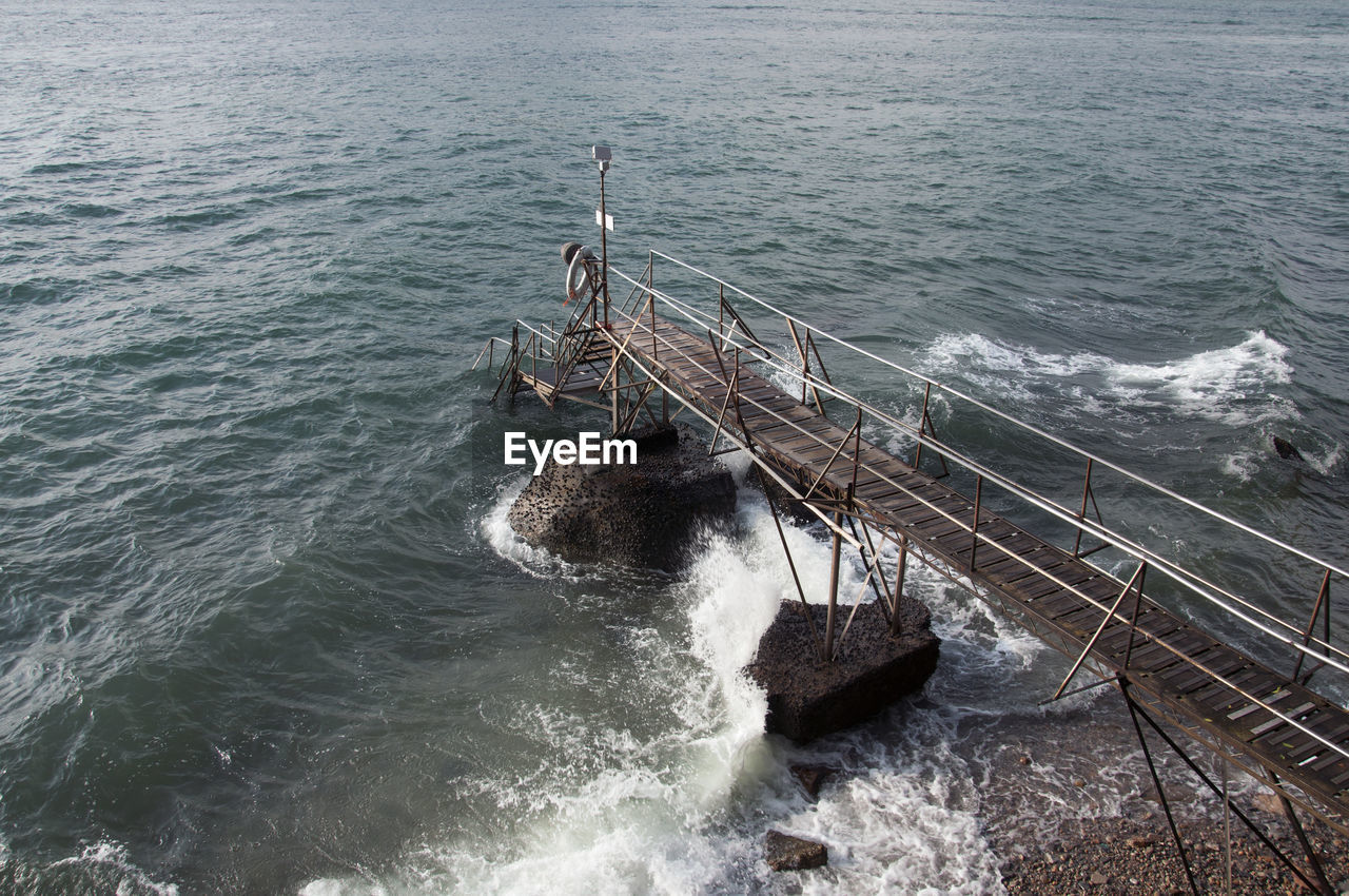 High angle view of waves in sea