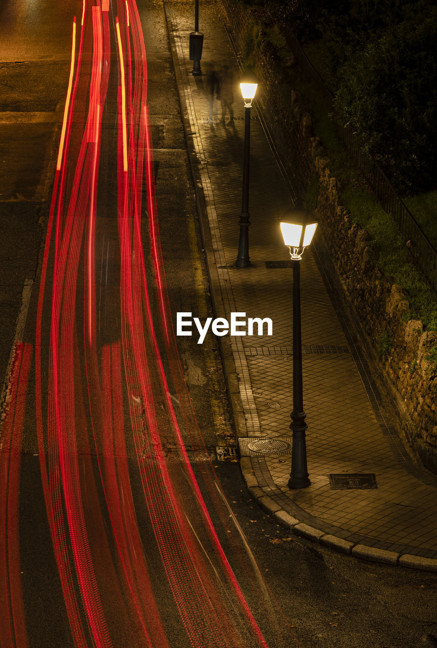 Street lamps on street at night. madrid, spain