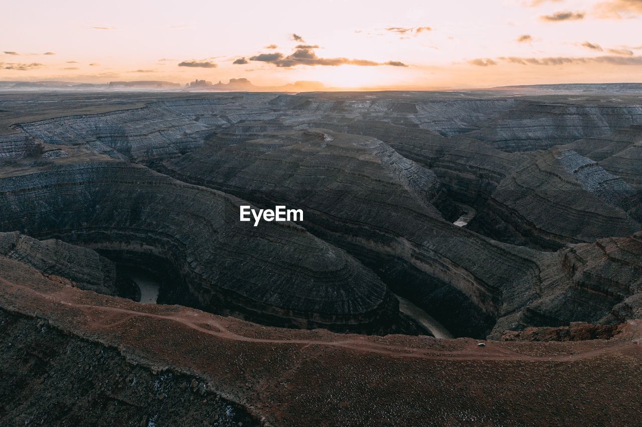 Aerial view of canyon landscape during sunset