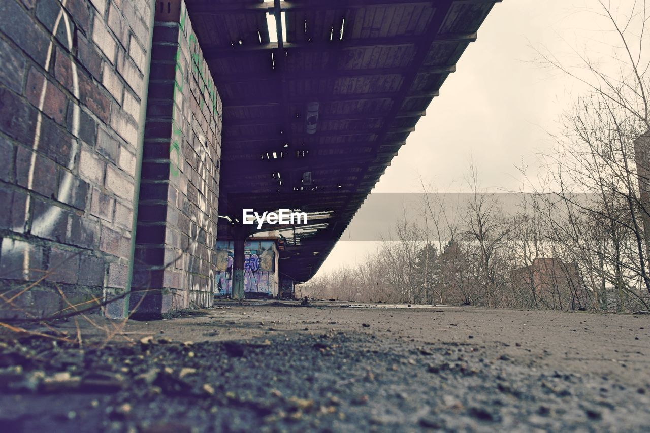 Surface level of walkway by abandoned building