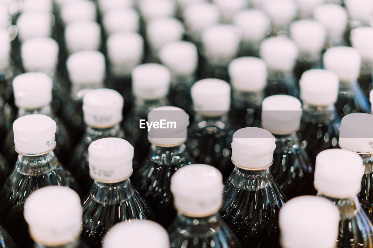 HIGH ANGLE VIEW OF BOTTLES