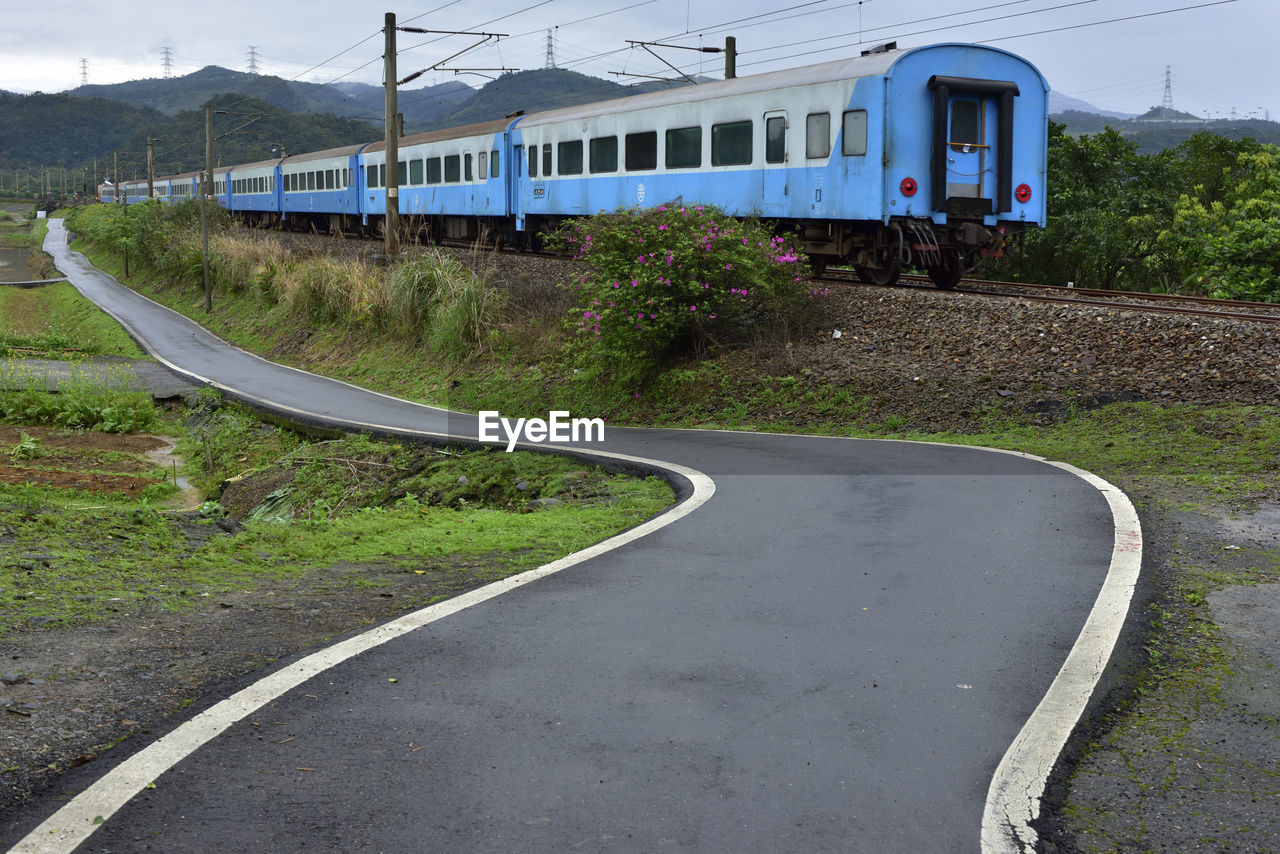 Train by empty road