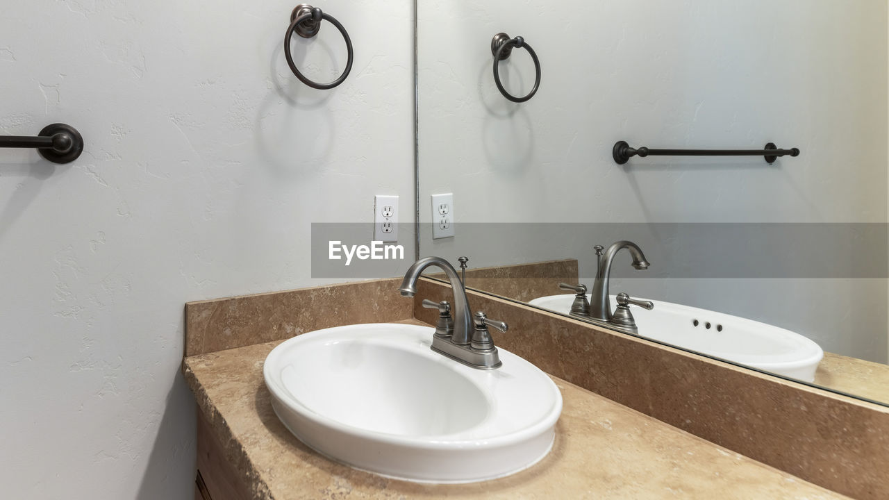 VIEW OF FAUCET IN BATHROOM