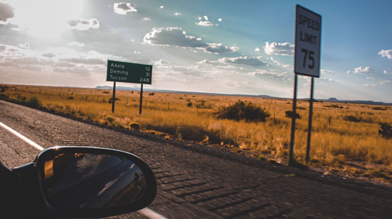 Road sign against the sky