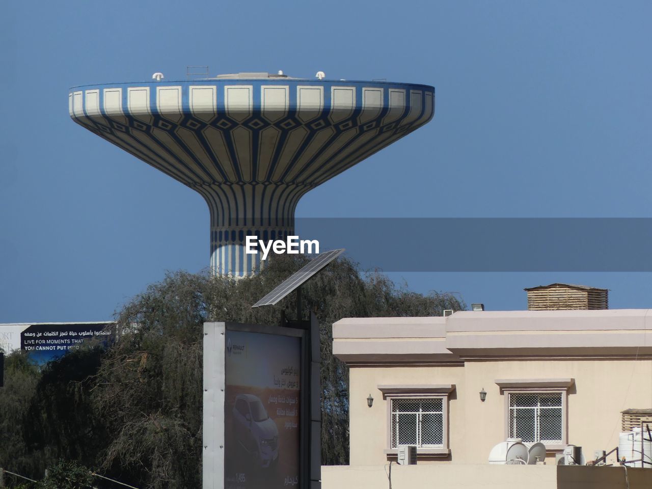 LOW ANGLE VIEW OF BUILDINGS AGAINST CLEAR SKY