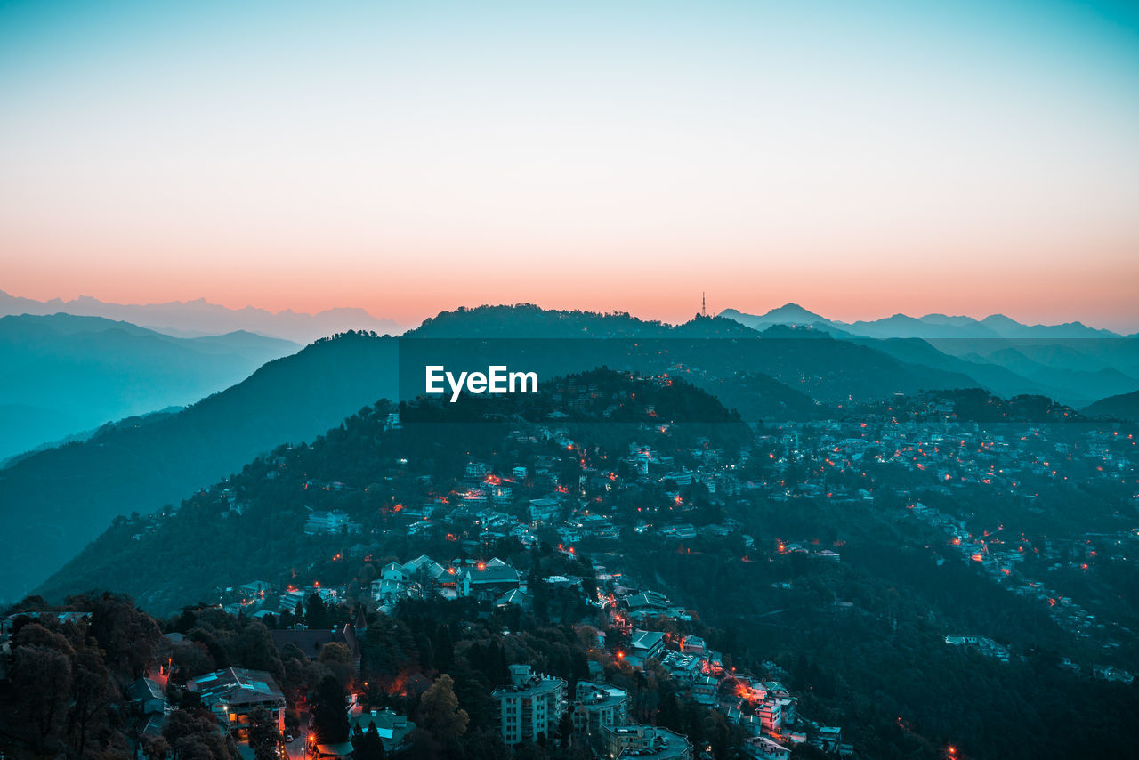 High angle view of cityscape against sky during sunset