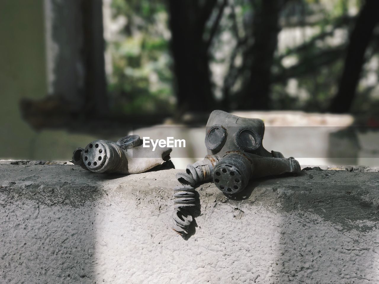 Close-up of gas masks on wall