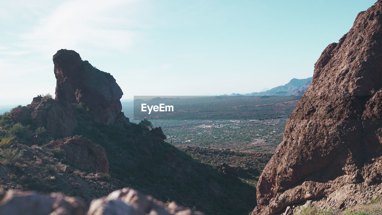 SCENIC VIEW OF ROCK FORMATION AGAINST SKY