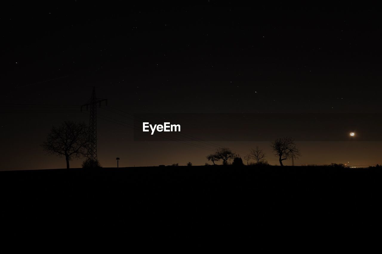 LOW ANGLE VIEW OF SILHOUETTE TREES AGAINST SKY DURING SUNSET