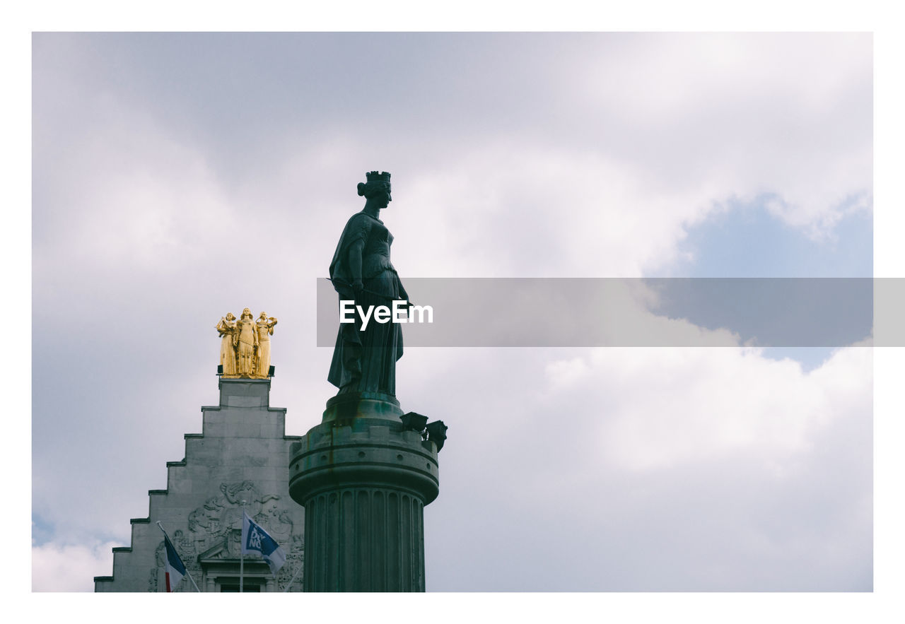 statue, sculpture, human representation, sky, cloud, architecture, representation, nature, low angle view, travel destinations, no people, travel, day, built structure, male likeness, monument, outdoors, city, the past, history, creativity, memorial