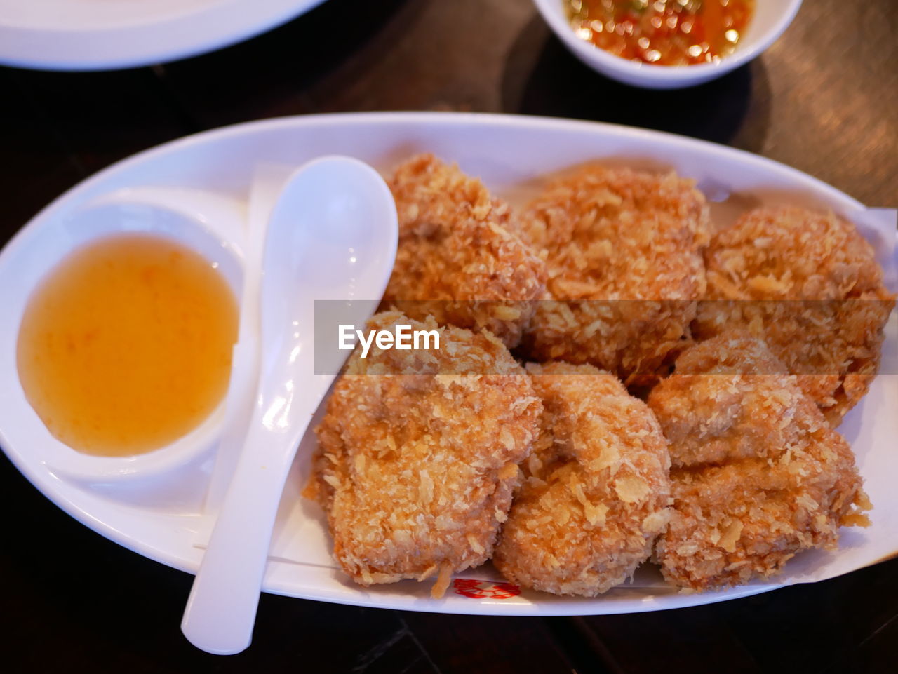 Close-up of deep fried shrimp cake in plate