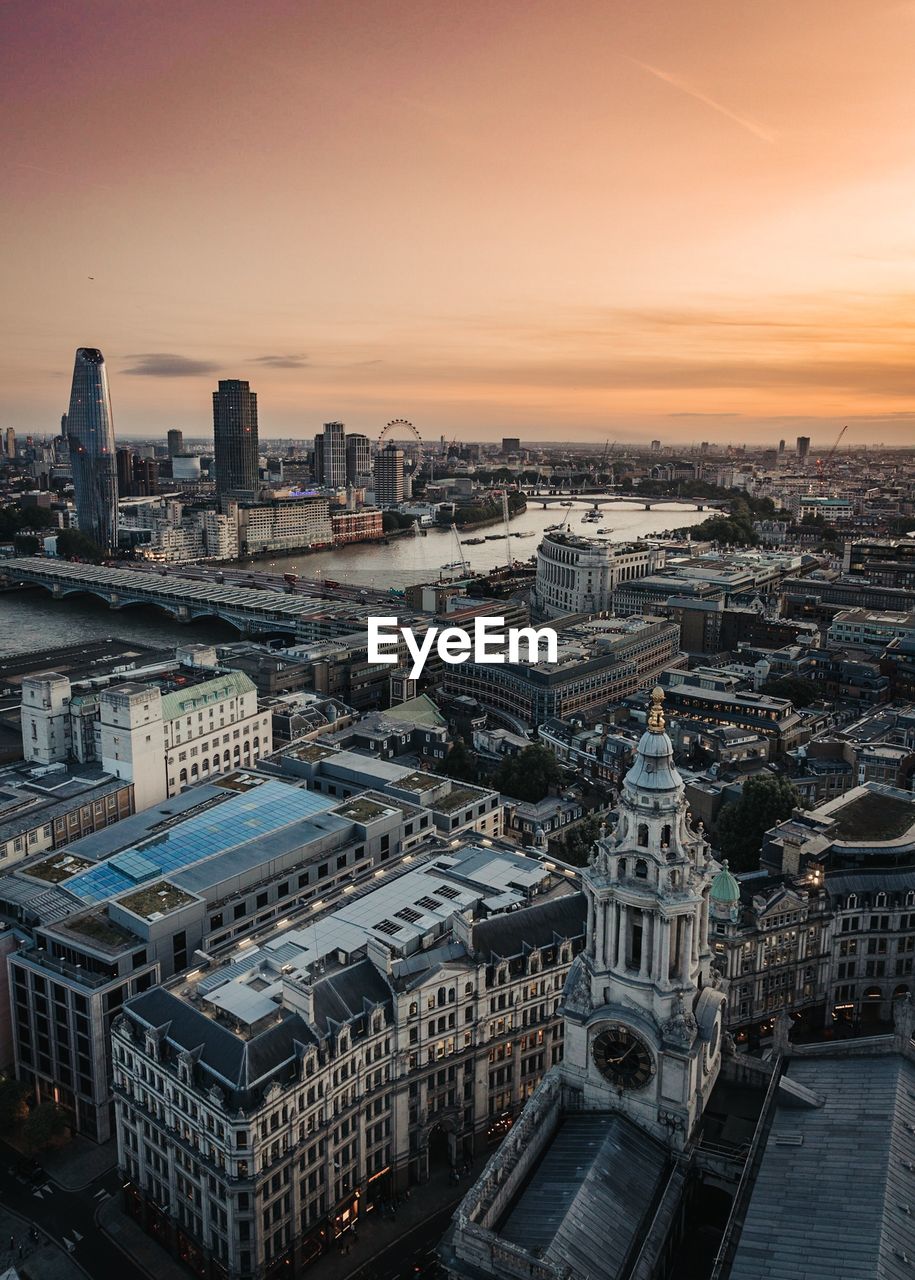High angle view of buildings in london city during sunset