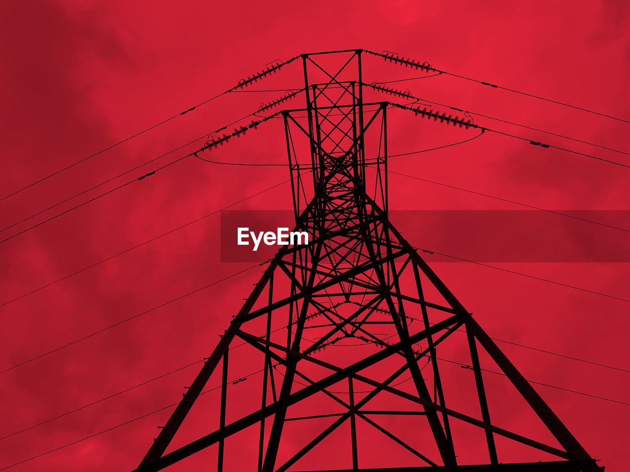 LOW ANGLE VIEW OF SILHOUETTE ELECTRICITY PYLON AGAINST SKY AT DUSK