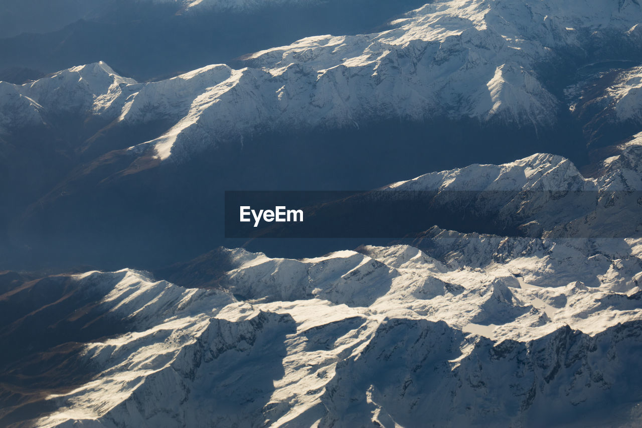 Scenic view of snow covered mountains