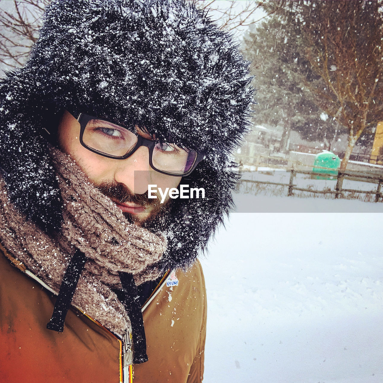 Portrait of smiling woman in snow