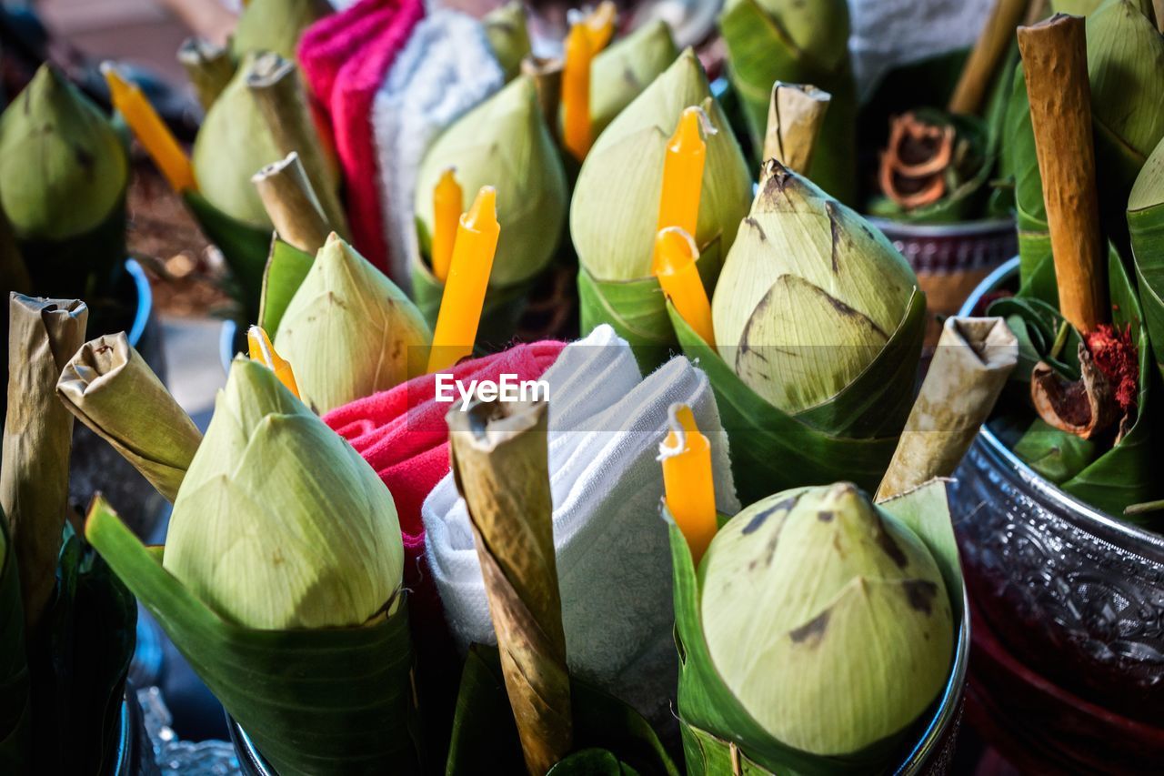 Religious offering of banana flower and candles ready to float for loi krathong festivals