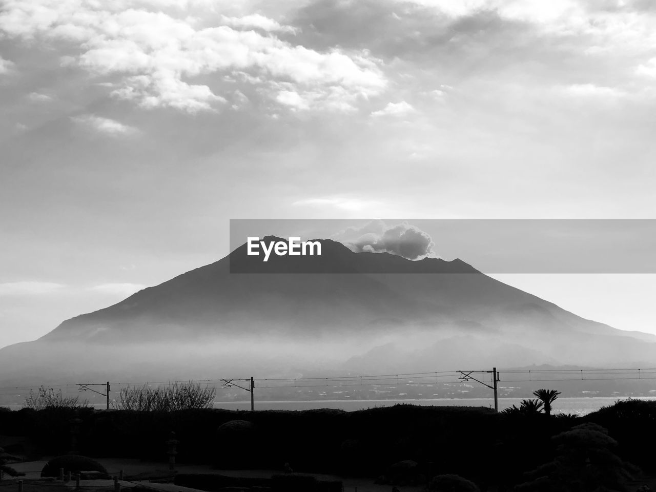 Scenic view of silhouette mountains against sky