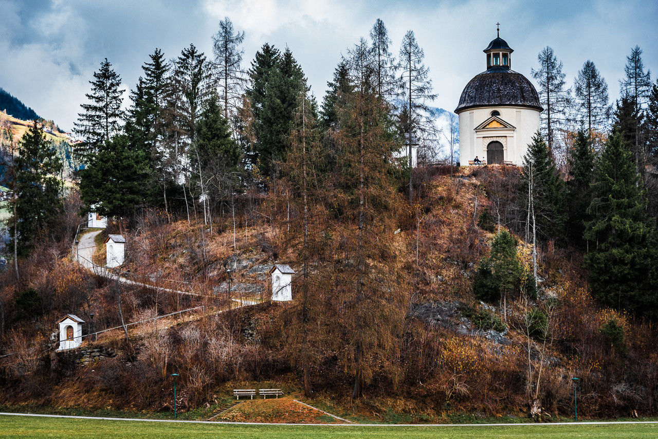 tree, plant, architecture, built structure, building exterior, sky, nature, building, travel destinations, place of worship, religion, history, the past, cloud, château, grass, no people, tower, rural area, belief, land, travel, outdoors, tourism, spirituality, autumn, day, landscape