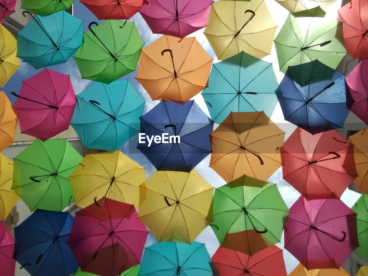 Full frame shot of colorful umbrellas hanging
