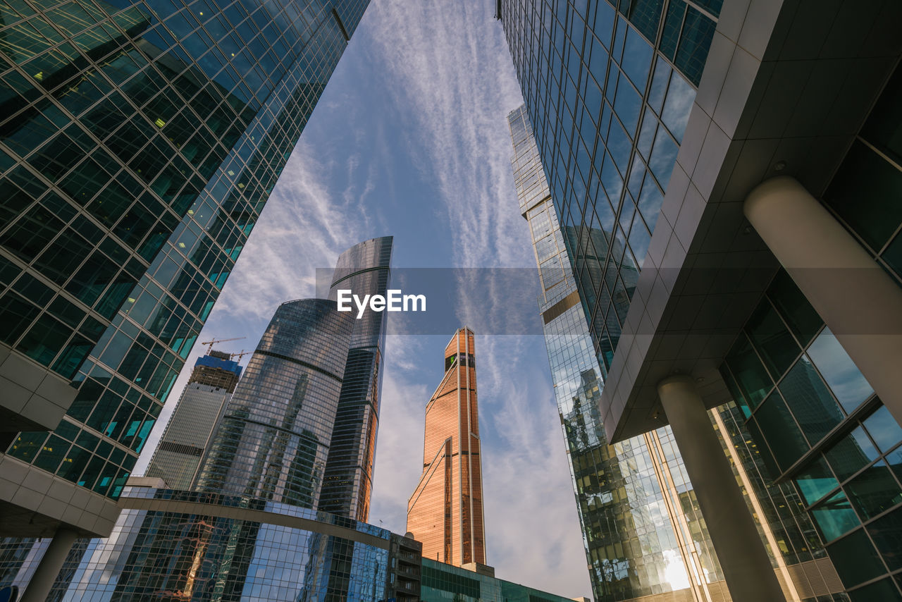 Low angle view of modern buildings against sky