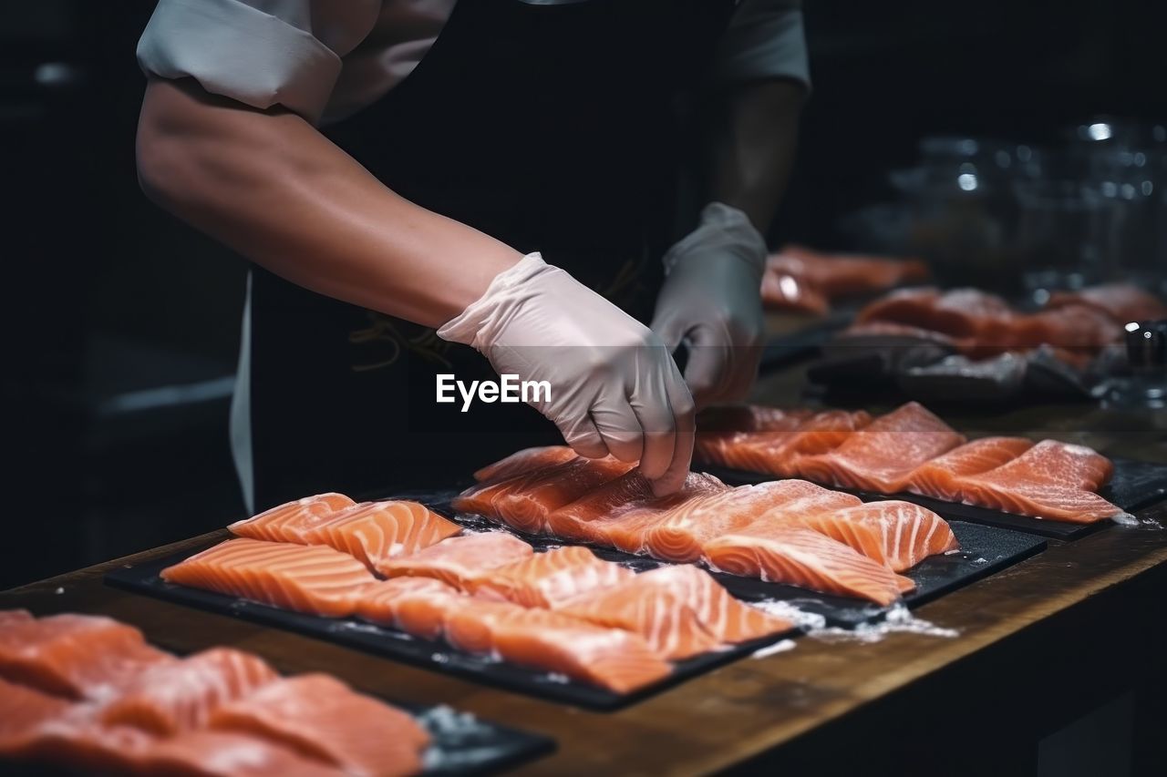 cropped hands of man preparing food