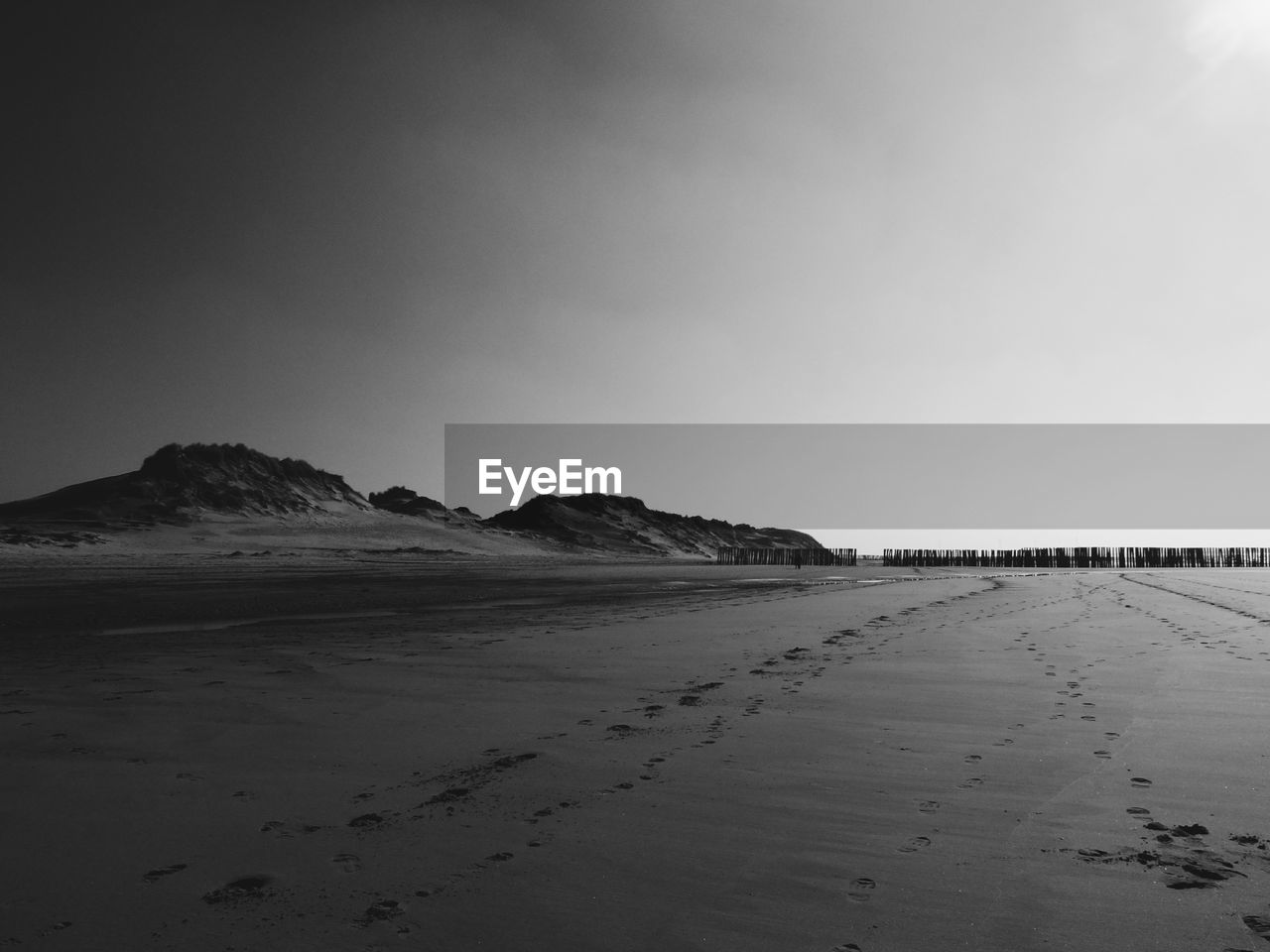 Scenic view of beach against sky