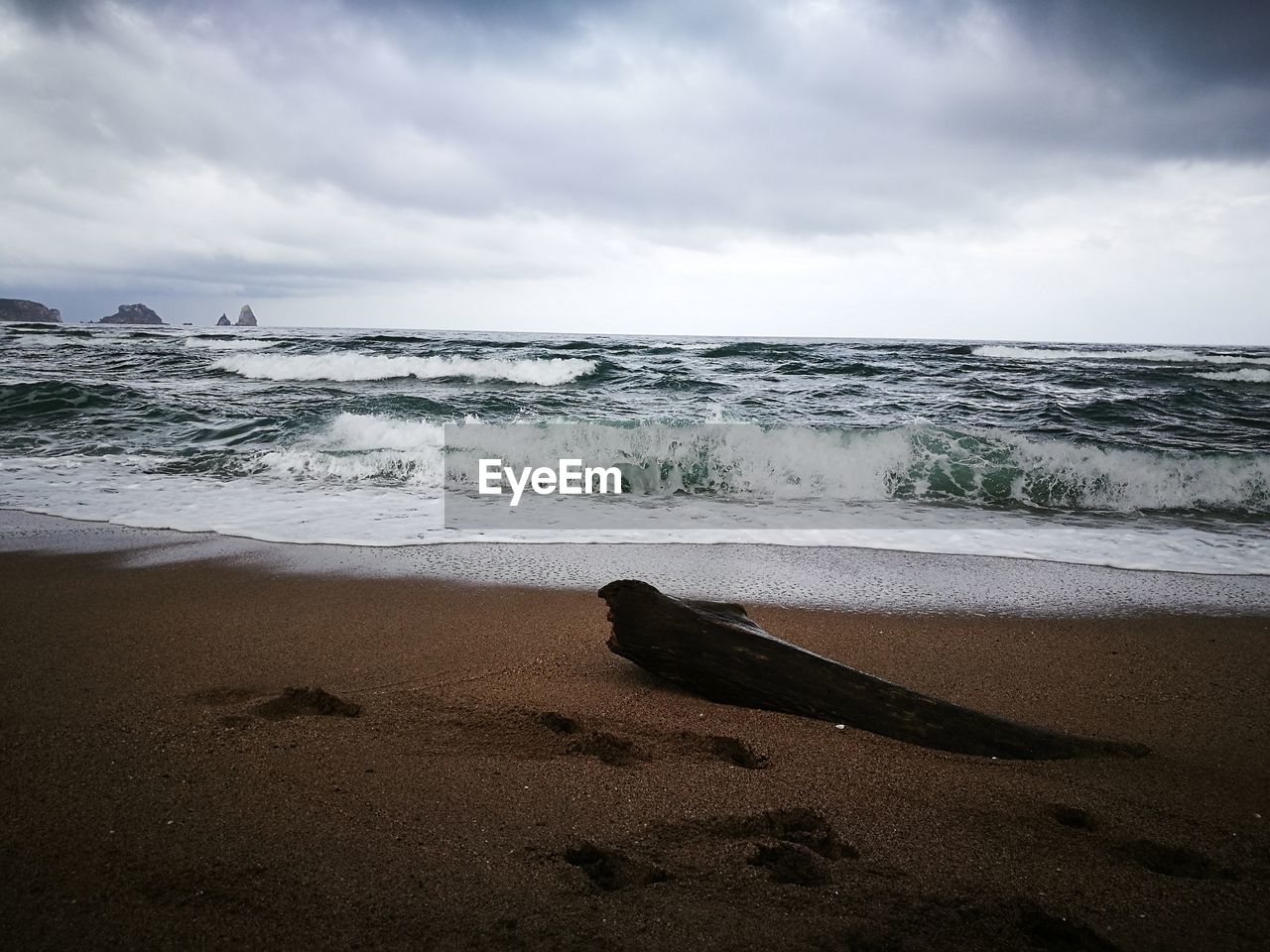 VIEW OF BEACH AGAINST SKY