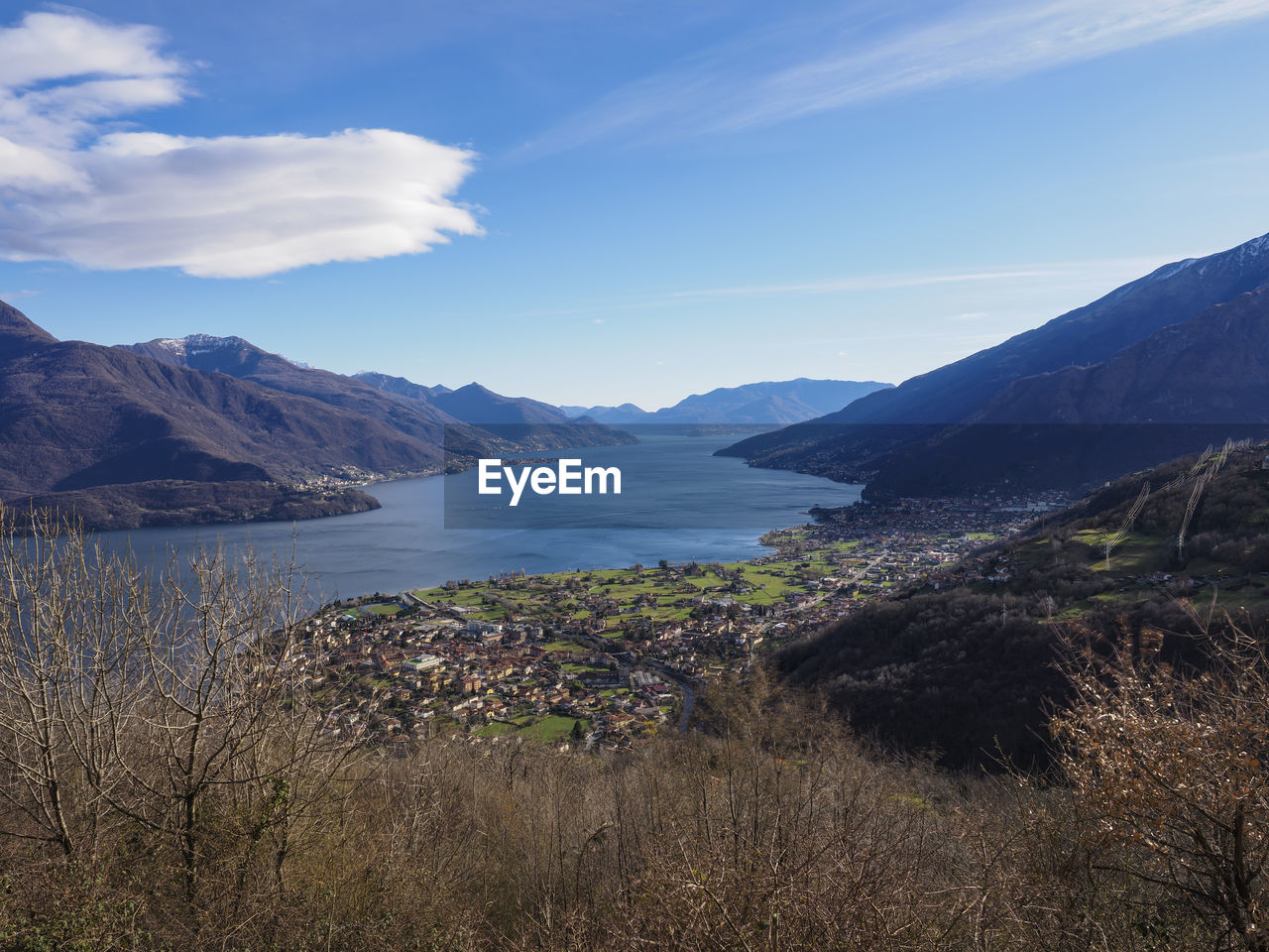 mountain, sky, scenics - nature, environment, nature, landscape, water, beauty in nature, lake, mountain range, wilderness, cloud, land, plant, no people, travel destinations, tranquility, travel, tranquil scene, highland, outdoors, day, tourism, non-urban scene, reflection, blue, tree, ridge