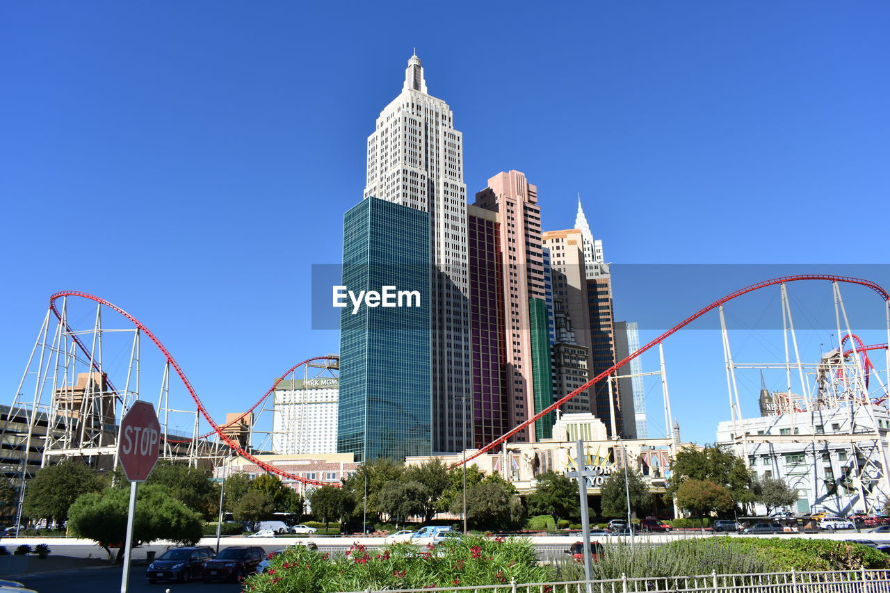 MODERN BUILDINGS AGAINST BLUE SKY