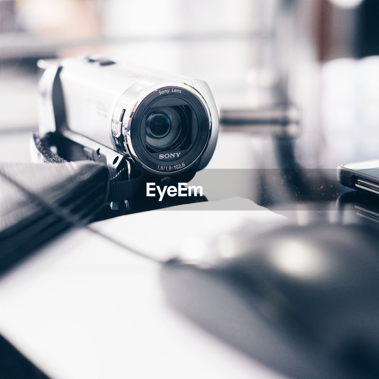 CLOSE-UP OF CAMERA AND KEYBOARD