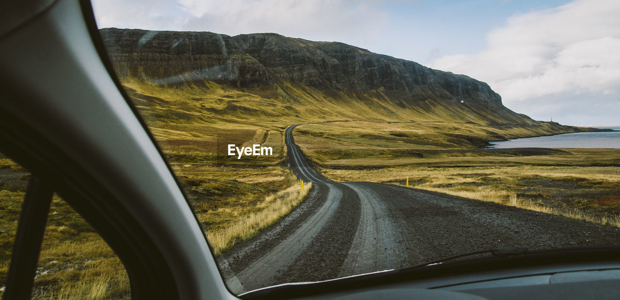 Road seen through car windshield