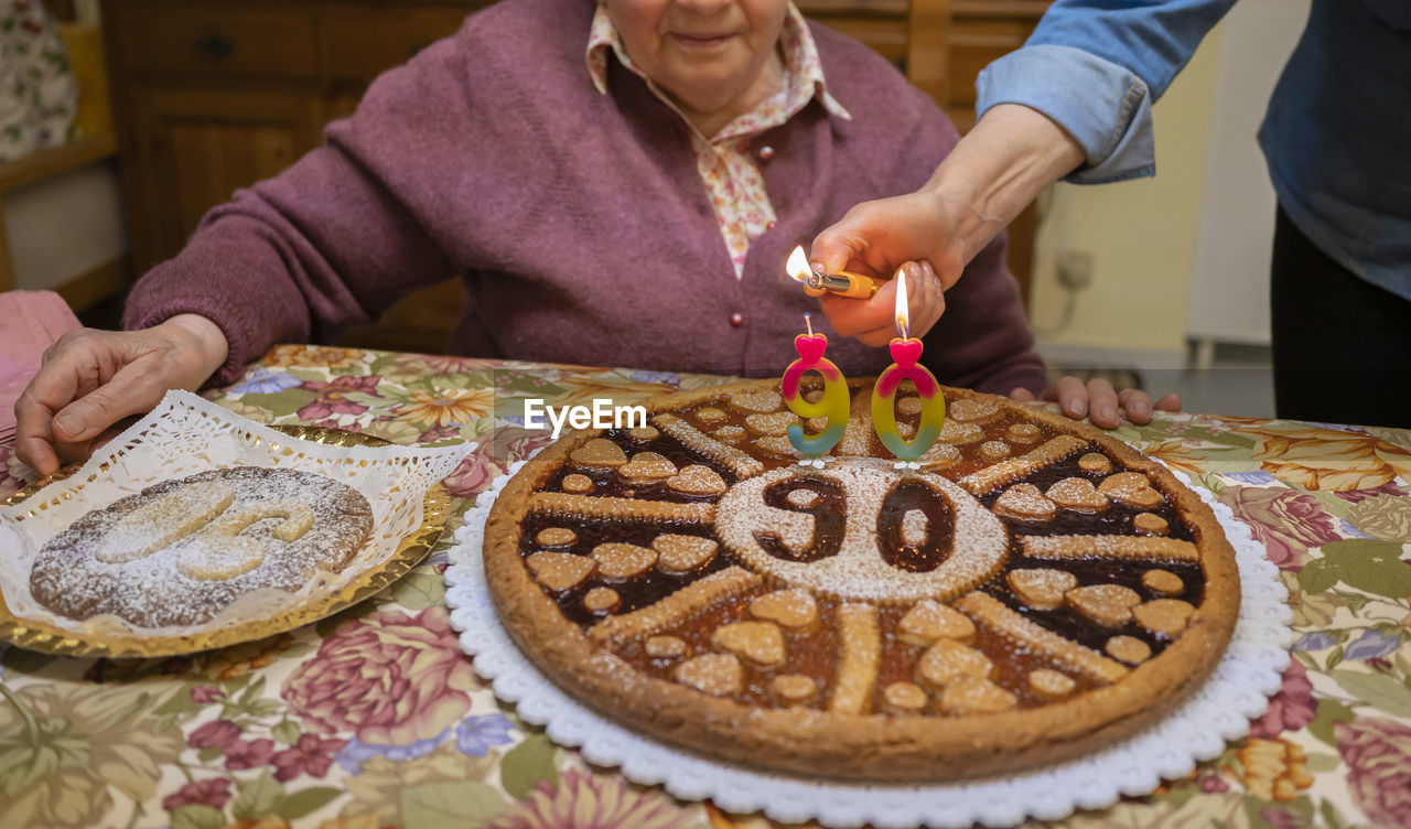 Senior woman at 90's birthday party