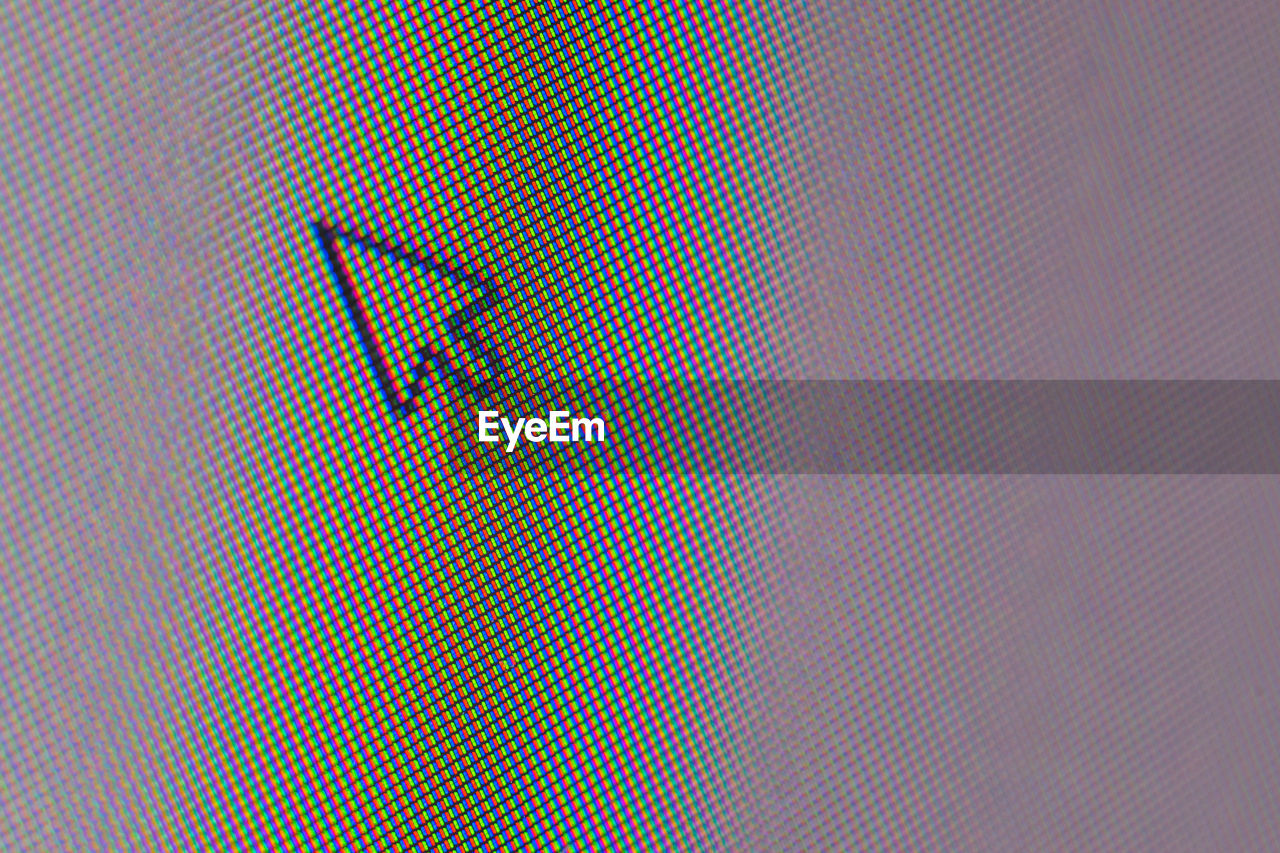 Close-up of cursor on computer monitor