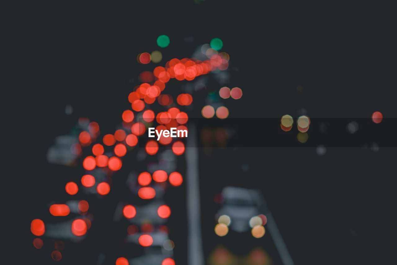 Defocused image of car lights at night