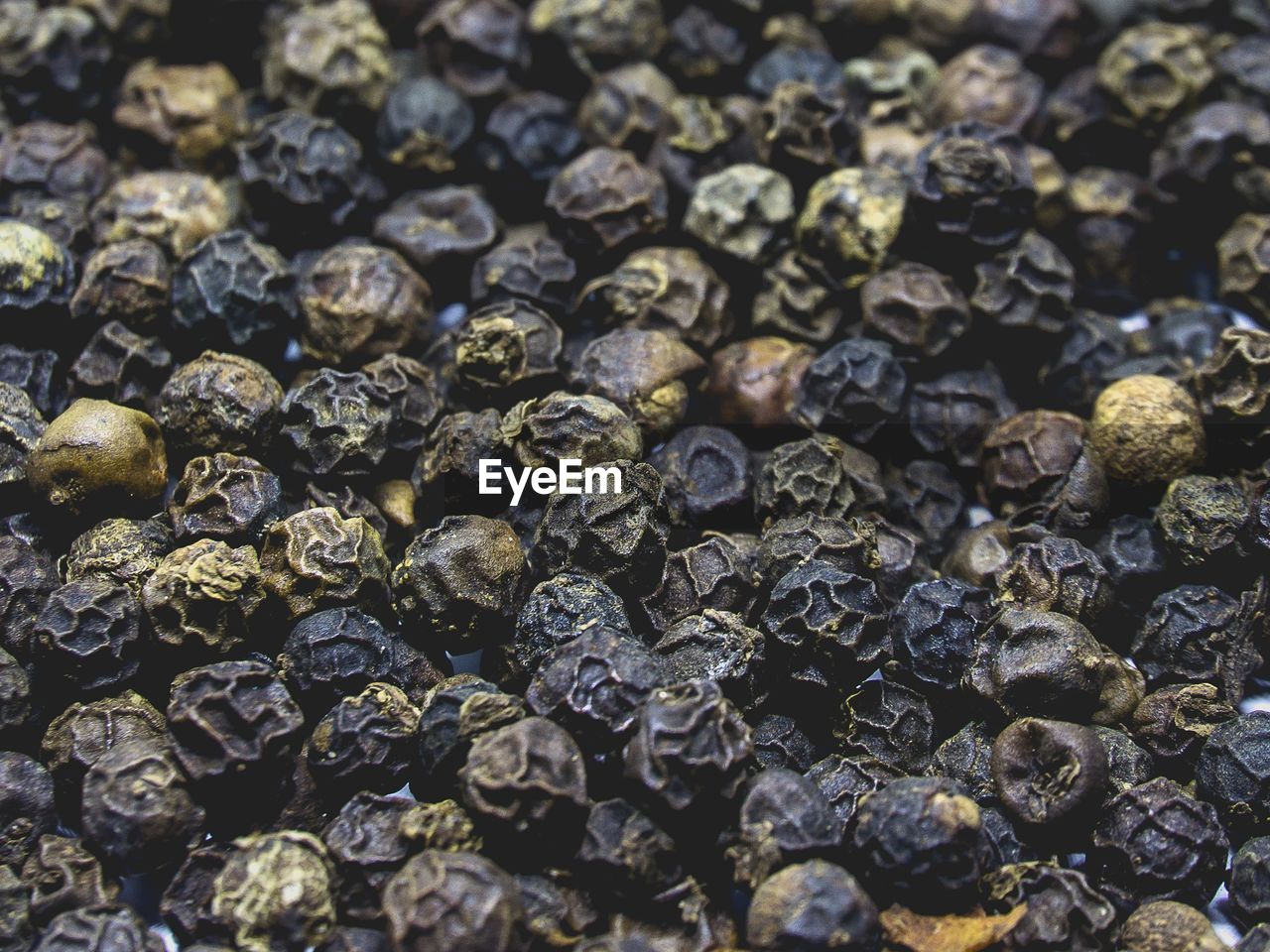 Full frame shot of black peppercorns