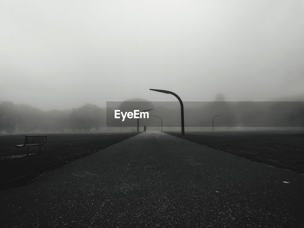 Road against sky during foggy weather