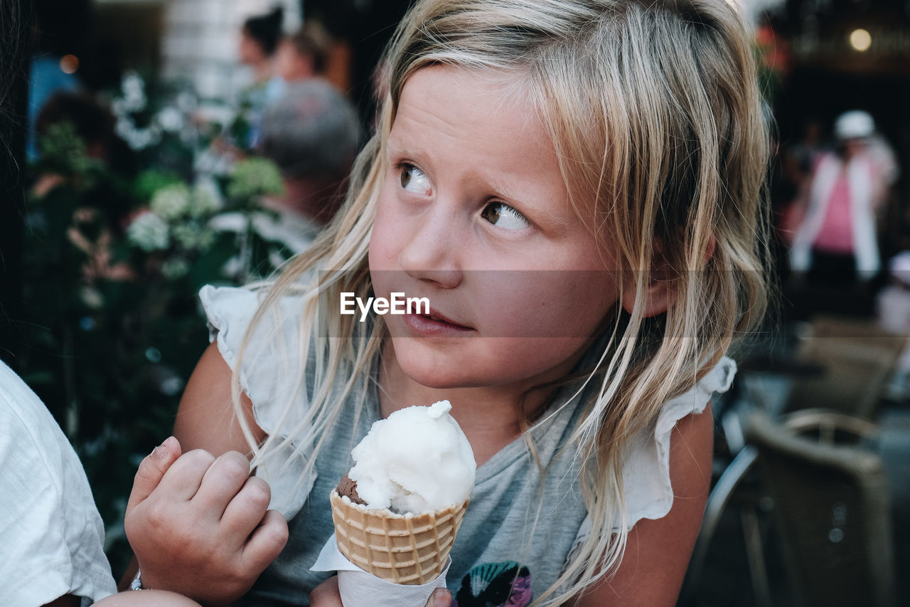 Close-up of girl holding ice cream