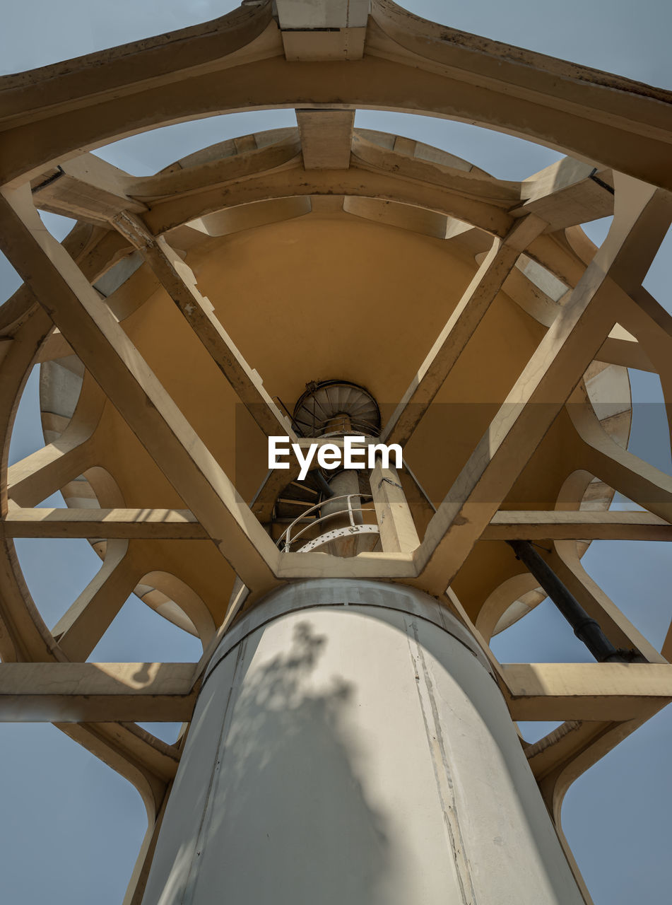 low angle view of metallic structure against sky